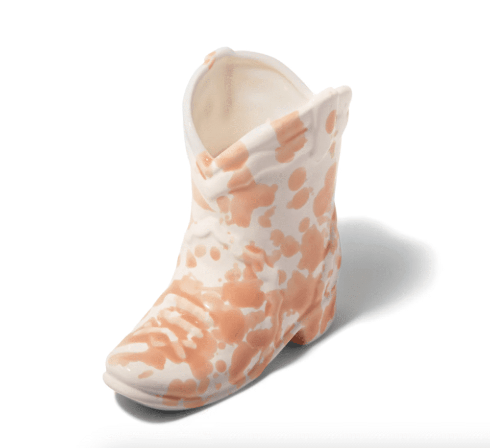 170 gram Cactus flower scented candle in ceramic cowboy boot shaped vase with pink speckled pattern
